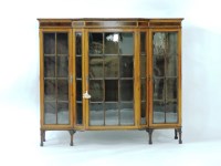 Lot 390 - An Edwardian mahogany and satinwood crossbanded breakfront glazed display cabinet