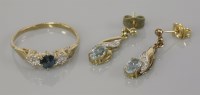 Lot 13 - A 9ct gold blue topaz and diamond ring