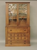 Lot 413 - A mid 19th century mahogany secretaire bookcase