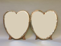 Lot 254 - A pair of heart shaped easel mirrors