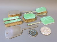 Lot 68 - A silver and green enamel dressing table set