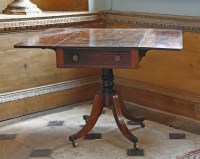 Lot 407 - A Regency mahogany single pedestal Pembroke table