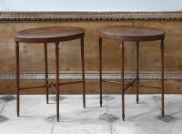 Lot 415 - A close matched pair of strung and crossbanded mahogany occasional tables