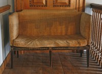 Lot 421 - A Sheraton period two-seater settee