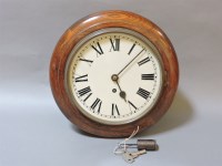 Lot 356 - A German oak cased wall clock