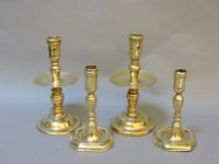 Lot 304 - Two 'Hemskirk' brass candlesticks