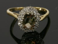 Lot 191 - An andalusite and diamond cluster ring