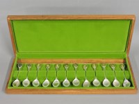 Lot 258 - A set of twelve The Royal Horticultural Society flower spoons