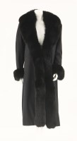 Lot 374 - An Aquascutum black gabardine coat