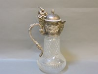 Lot 445 - A late 19th century silver-plated and cut glass claret jug