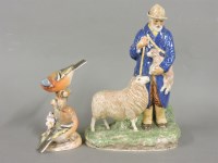 Lot 299 - A pottery figure of a shepherd