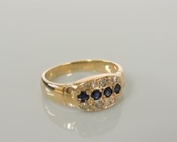 Lot 182 - A 9ct gold sapphire and diamond ring