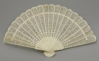 Lot 578 - A carved bone Fan