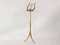 Lot 575 - A reproduction painted music stand