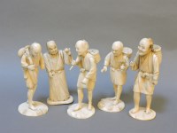 Lot 224 - Five Japanese carved ivory sectional figures