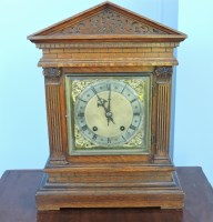 Lot 654 - A Victorian oak bracket clock