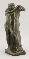 Lot 177 - A patinated bronze group