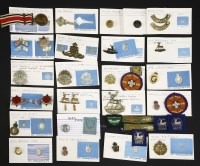 Lot 116 - A box of twenty-four badges and buttons