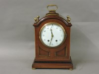 Lot 253 - A mahogany and gilt mounted mantel clock