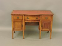 Lot 560 - An Edwardian mahogany and satinwood cross banded desk