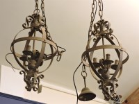 Lot 586 - A pair of iron hanging lamps