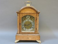 Lot 487 - A German inlaid walnut mantel clock