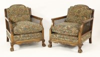 Lot 713 - A pair of late Victorian bergère chairs
