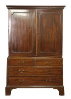 Lot 579 - A Georgian mahogany linen press