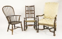 Lot 628 - A Lancashire spindle back rush seat rocking chair