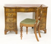 Lot 642 - A burr walnut pedestal desk