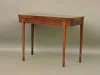 Lot 556 - A strung mahogany tea table