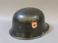 Lot 82 - A reproduction WWll German helmet.