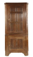 Lot 693 - An Irish mahogany standing corner cupboard