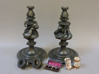 Lot 124 - A pair of Art Nouveau style bronze candle holders