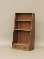 Lot 443 - A Regency period small waterfall mahogany book shelf