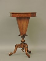 Lot 593 - A Victorian walnut trumpet form sewing table