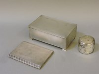 Lot 157 - An engine turned silver cigarette box