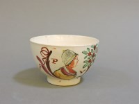 Lot 332 - A mid to late 18th century cream ware tea bowl