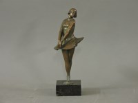 Lot 373 - An Art Deco bronze figure of a demure girl