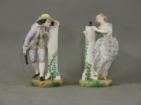 Lot 395 - A pair of 19th century painted parian ware figures