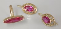 Lot 26 - A Russian gold synthetic ruby ring and earrings matched suite