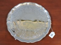 Lot 300 - A Georgian silver and later engraved salver