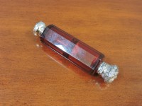 Lot 310 - A Victorian cranberry glass double end scent bottle