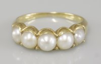Lot 93 - An Edwardian five stone split pearl ring