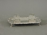 Lot 306 - A silver desk tidy