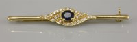 Lot 80 - A sapphire and diamond bar brooch