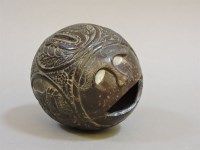 Lot 316 - An early to mid 19th century coconut piggybank