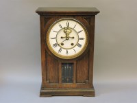 Lot 489 - A Victorian oak cased mantel clock