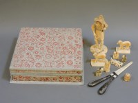 Lot 286 - An ivory hound and stag