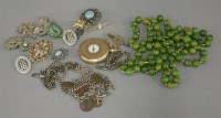 Lot 66 - A green glass bead necklace
